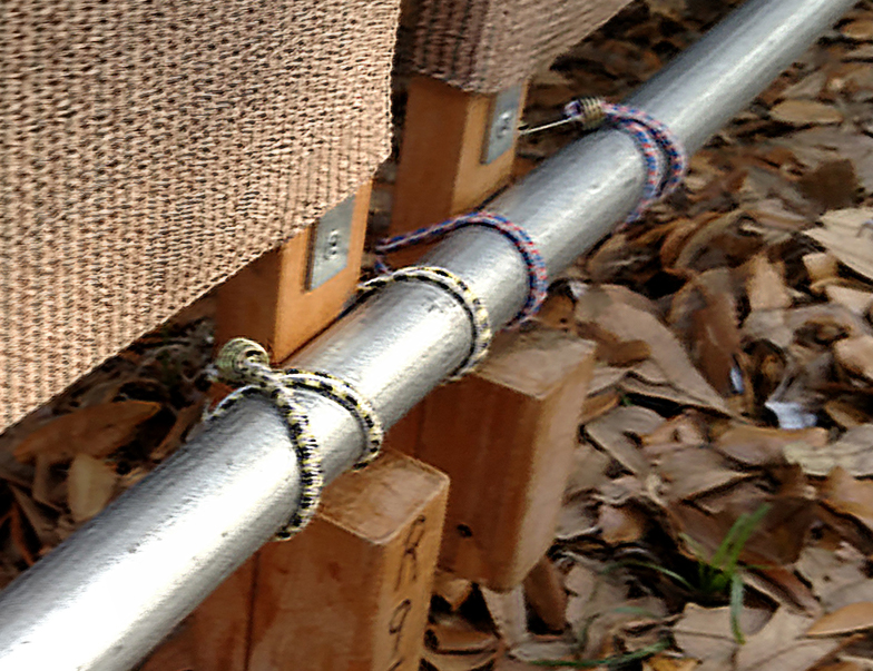Panel bungees from outside tent