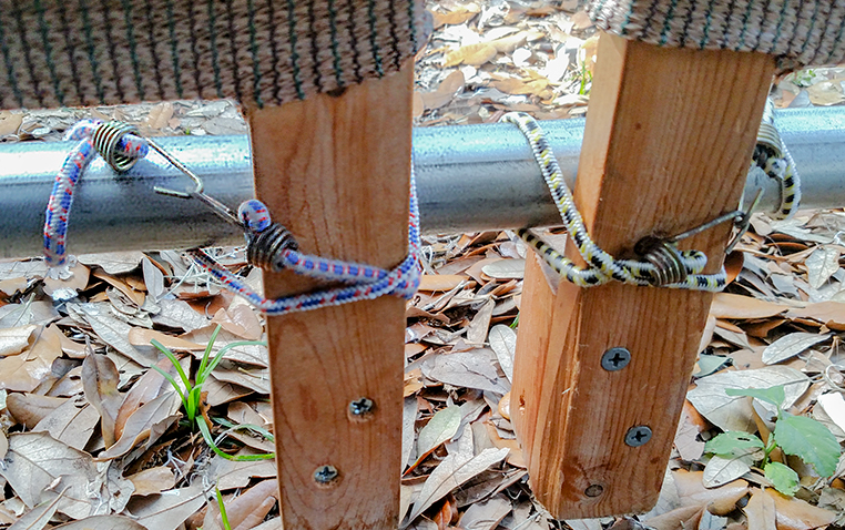 Panel bungees from inside tent